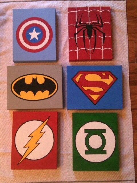 six superhero themed coasters on top of a towel