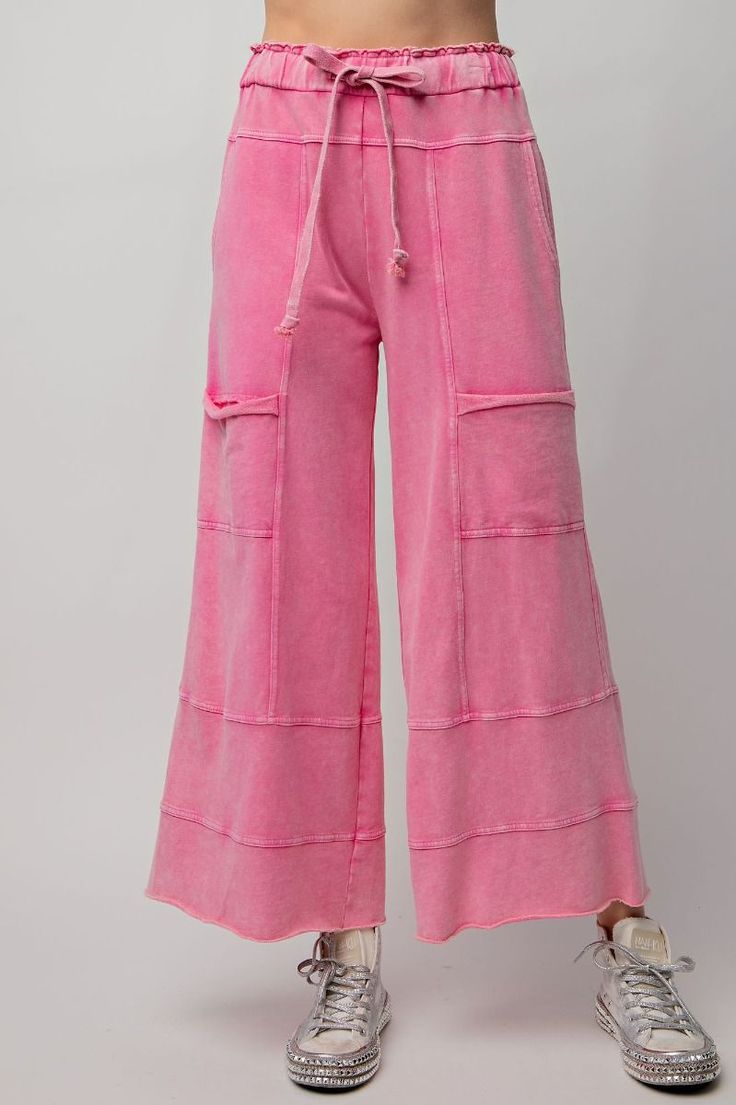 These may be the best lounge pants we've ever seen. Mineral washed Terry knit pants featuring cargo style pockets, wide legs, elastic ached waist and adjustable drawstring. Features exposed seaming. Relaxed and loose fit. Washed pink in color Model is 5'10 wearing a size small -Small measurements : length - 37' & waist -14' 100% Cotton Knit Wide Leg Pants, French Terry Pants, Cotton Cargo Pants, Solid Color Pants, Cargo Style, Knee Dress, Mid Dresses, Mid Length Dresses, Wide Legs