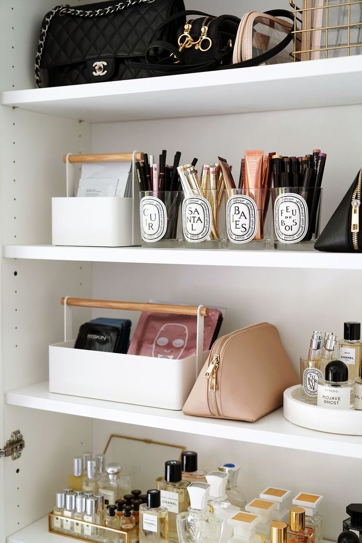 the shelves are filled with cosmetics and other personal care products, such as makeup bottles