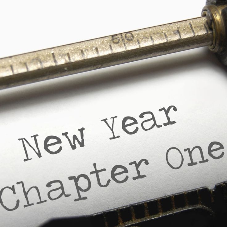 an old typewriter with the words new year, chapter one printed on it