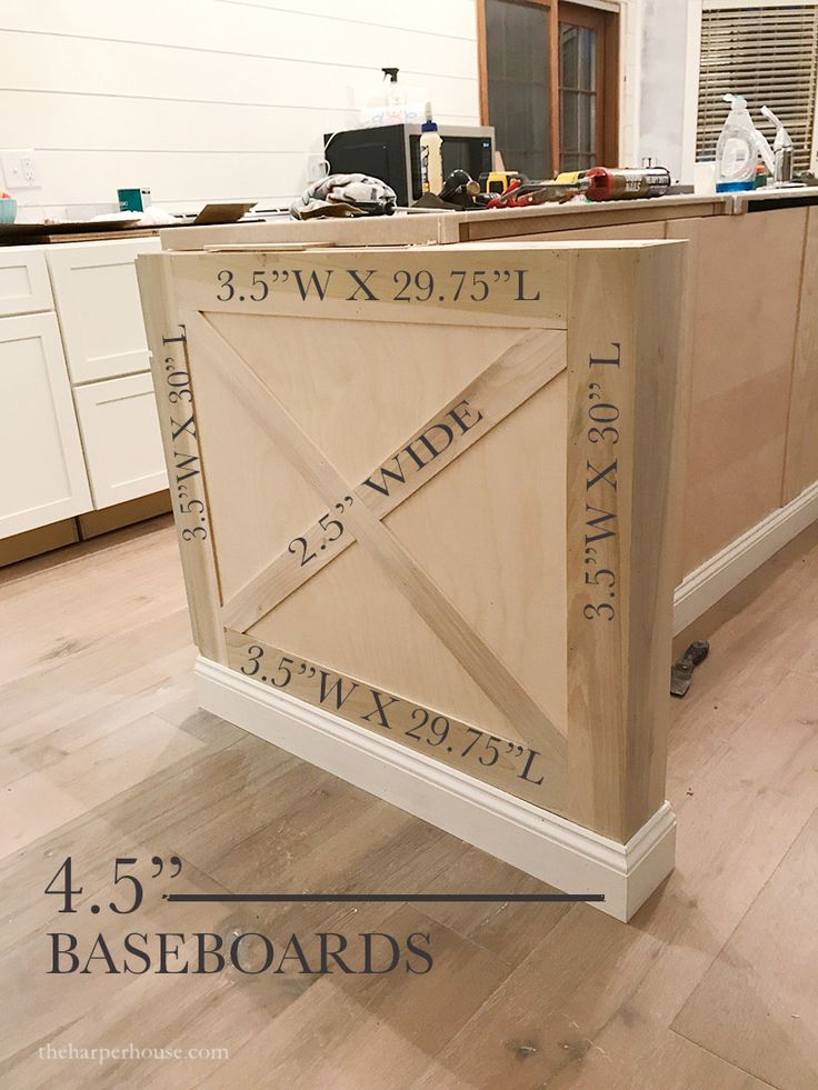 an unfinished kitchen island with measurements for the top and bottom panels on it's sides