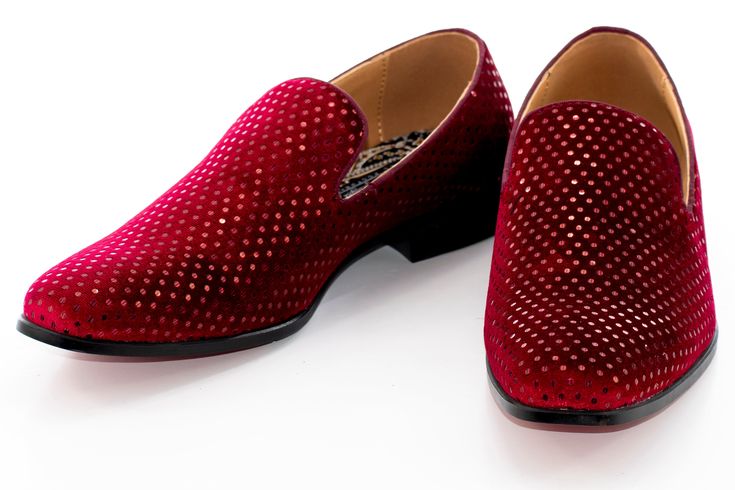 This luxurious burgundy slip-on loafer is perfect for weddings, proms or any formal event. The silhouette, color, patterned material, and style are sure to pair wonderfully with a variety of suits, tuxedos and dinner jackets. *As these styles of shoe tend to run larger than most regular footwear, dolce vita MEN please requests that you size down a half size (or a whole size where half is not available) to get the best fit. Red Loafers For Fall Party, Luxury Suede Party Loafers, Elegant Party Loafers With Red Sole, Party Suede Loafers With Leather Sole, Luxury Suede Loafers For Party, Elegant Suede Loafers For Party, Party Slip-ons With Leather Sole, Formal Slip-on Loafers With Perforations, Elegant Burgundy Pointed Toe Loafers