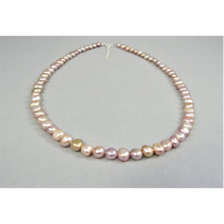 A lustrous and colorful real pink freshwater pearl bead necklace created with natural irregular-shaped baroque pearls and your favorite metal choice, 925 sterling silver or 14K gold fill. The necklace has a spring ring clasp and 2-inch attached adjustable chain so every woman can get just the right fit. The 7-8mm pearl nuggets range in color from pale pink to golden peach and blush lavender to dark mauve.  A lovely style for everyday casual and elegant dressy occasions. Free USPS first class dom Pink Polished Beads Pearl Necklace As A Gift, Pink Pearl Necklace With Round Beads And Pendant, Pink Pearl Necklace With High Luster, Pink Pearl Necklaces With Polished Beads, Pink Pearl Necklace With Faceted Beads As Gift, Pink Polished Bead Pearl Necklace For Gifts, Pink Polished Beads Pearl Necklace For Gifts, Pink High Luster Pearl Necklace, Pink Pearl Necklace With Polished Beads