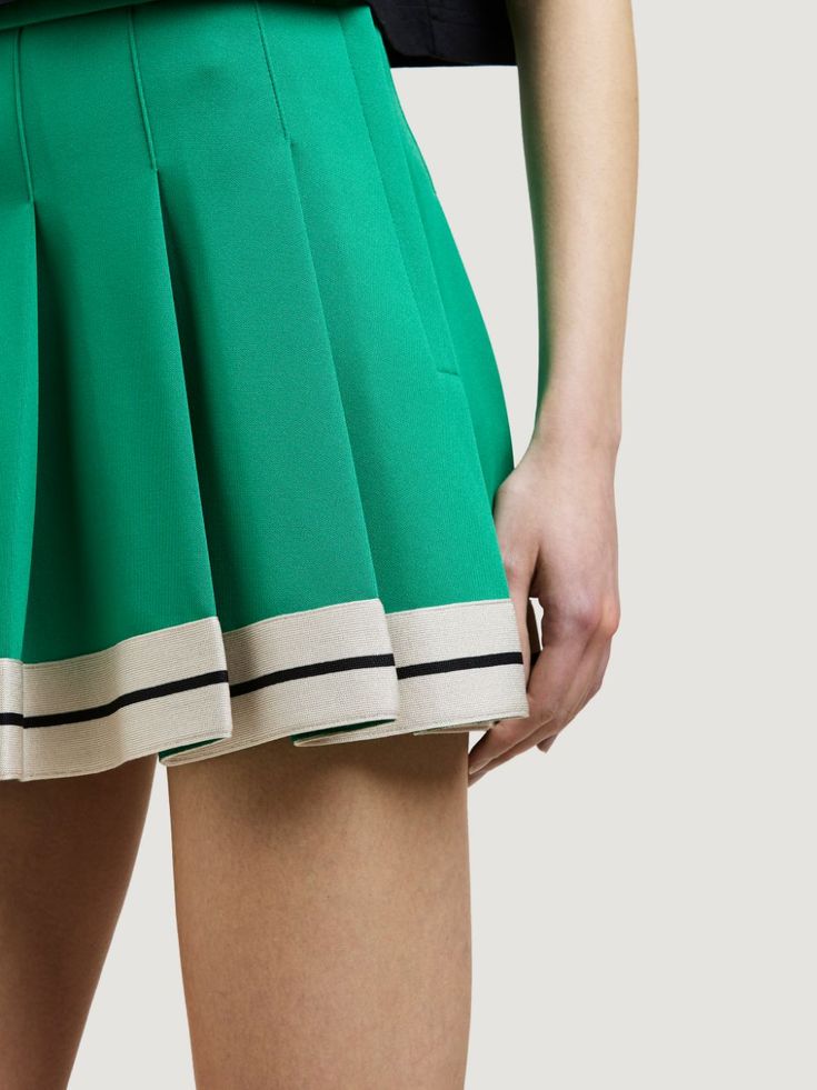 TRACK PLEATED SKIRT - Palm Angels® Official Knife Pleated Skirt Green, Green A-line Pleated Skirt, Luxury Pleated Hem Mini Skirt, Green Voluminous Pleated Skirt, Solid A-line Pleated Skirt With Accordion Pleats, Ribbed Skirt, Knife Pleat, Palm Angels, Skorts