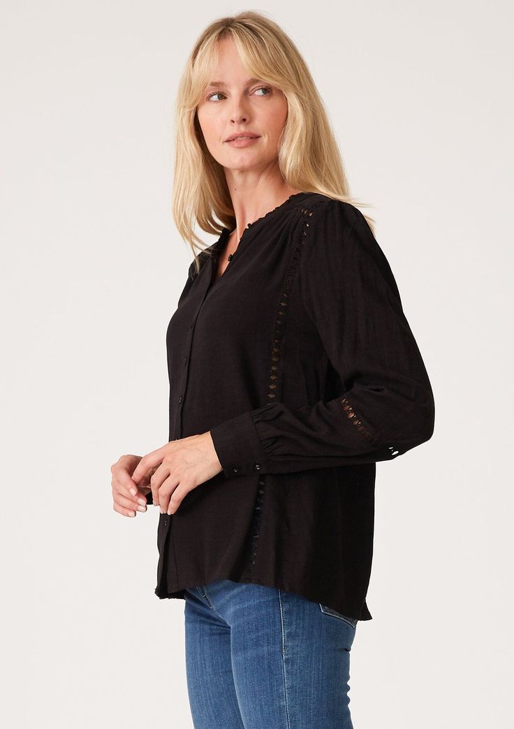 A timeless linen blend bohemian blouse with delicate crochet trim. FINAL SALE Linen blend Crochet-trim Voluminous long sleeve Self-covered button wrist cuff Ruffled neckline Self-covered button-up front Bohemian shirt Delicate crochet trim elevates this essential bohemian blouse. Designed in a cool linen blend, with voluminous long sleeves, a delicate self-covered button front, and a flattering flowy fit. Tuck it into your favorite vintage denim for a classic California boho feel. Model is 5'9, Fall Casual Blouse With Lace Cuffs, Casual Fall Blouse With Lace Cuffs, Long Sleeve Tops With Crochet Trim For Layering, Elegant Long Sleeve Blouse With Crochet Trim, Spring Long Sleeve Blouse With Crochet Trim, Spring Crochet Trim Long Sleeve Blouse, Bohemian Tops With Button Cuffs And Long Sleeves, Elegant Long Sleeve Tops With Crochet Trim, Chic Long Sleeve Peasant Top With Lace Trim