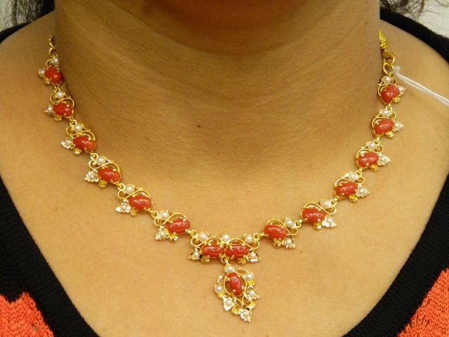 Coral Pearl Studded Gold Necklace Set Pagadala Necklace Gold, Coral Jewelry Set Pearl, Coral And Pearl Necklace, Ruby Jewelry Necklaces Simple, Pagadalu Necklace, Coral Studs In Gold, Pearl Necklace Designs Gold Indian, Pagadala Haram Designs, Corals And Pearls Jewellery