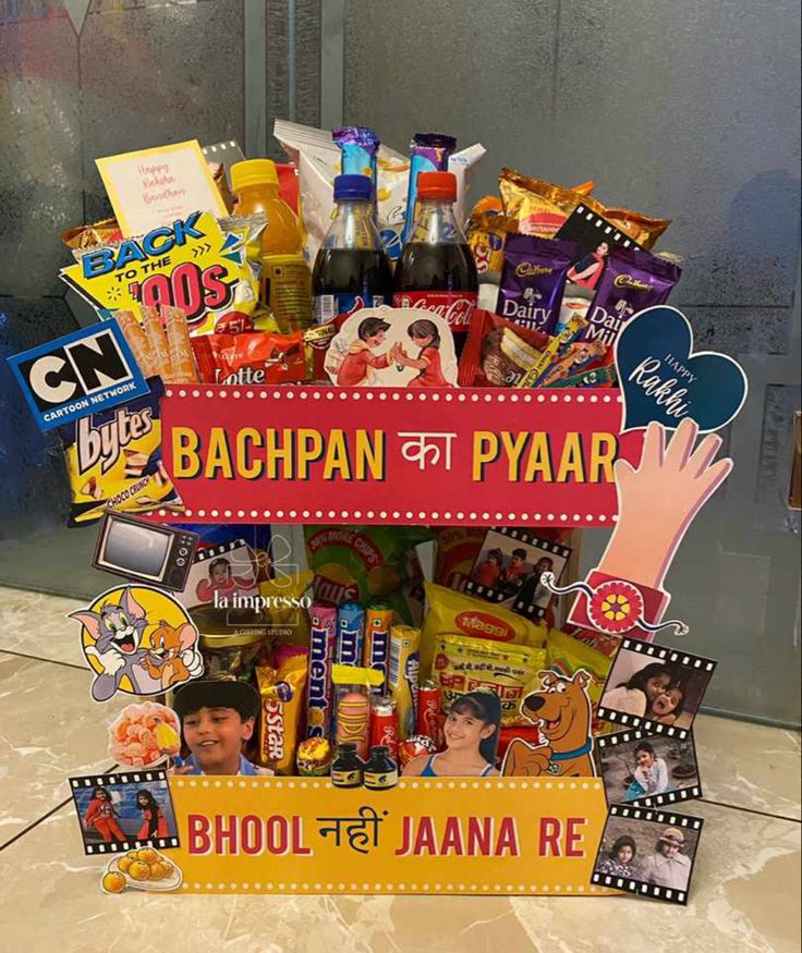 a basket filled with lots of different types of food and candy on top of a counter