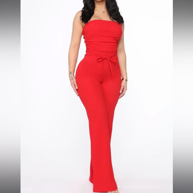 Fashionnova Red Jumpsuit, Lace Up Back With Hidden Zipper, Wide Leg. Brand New With Tags, Never Worn. Chic Red Strapless Jumpsuit For Spring, Red High-waisted Jumpsuits And Rompers For Summer, Red Strapless Jumpsuit For Night Out In Spring, Red Strapless Jumpsuit For Spring Night Out, Casual Red High Waist Jumpsuits And Rompers, Elegant Red Stretch Jumpsuits And Rompers, Red Fitted Strapless Jumpsuit For Summer, Red Fitted Strapless Jumpsuit For Party, Red High Waist Jumpsuits And Rompers For Party