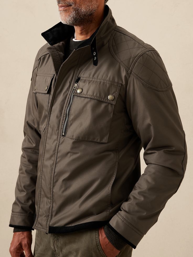 Moto imaginings flourish on this utilitarian style jacket inspired by earlier designs of the Royal Navy and reimagined in a super-sturdy recycled fabric.  Complete with a warm wool lining, quilted reinforcements to protect the shoulders and elbows, a Functional Quilted Jacket With Padded Collar For Fall, Utility Outerwear With Padded Collar For Outdoor, Casual Biker Jacket With Padded Collar For Outdoor, Winter Functional Utility Jacket With Patch Pockets, Outdoor Utility Jacket With Padded Collar, Outdoor Long Sleeve Utility Jacket With Padded Collar, Functional Quilted Jacket With Pockets For Fall, Quilted Utility Jacket For Winter, Functional Fall Outerwear For Urban Adventures