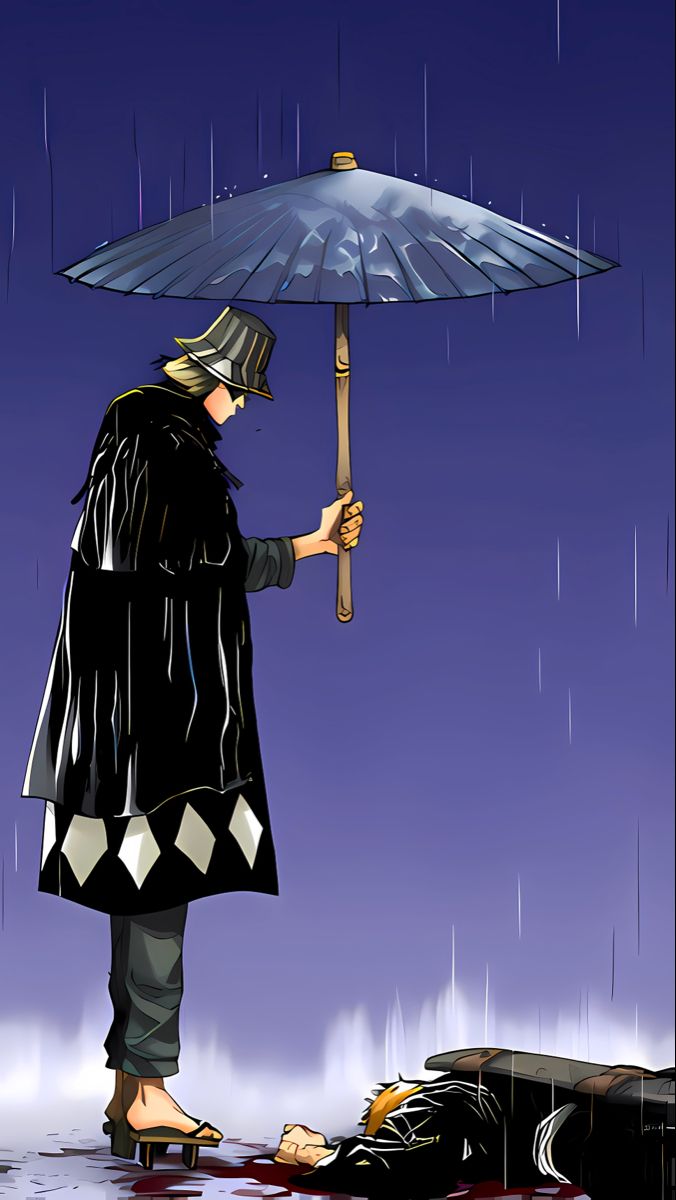 a man holding an umbrella in the rain