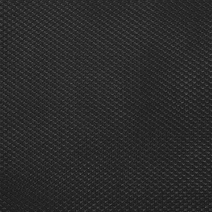 black textured fabric with white dots on it