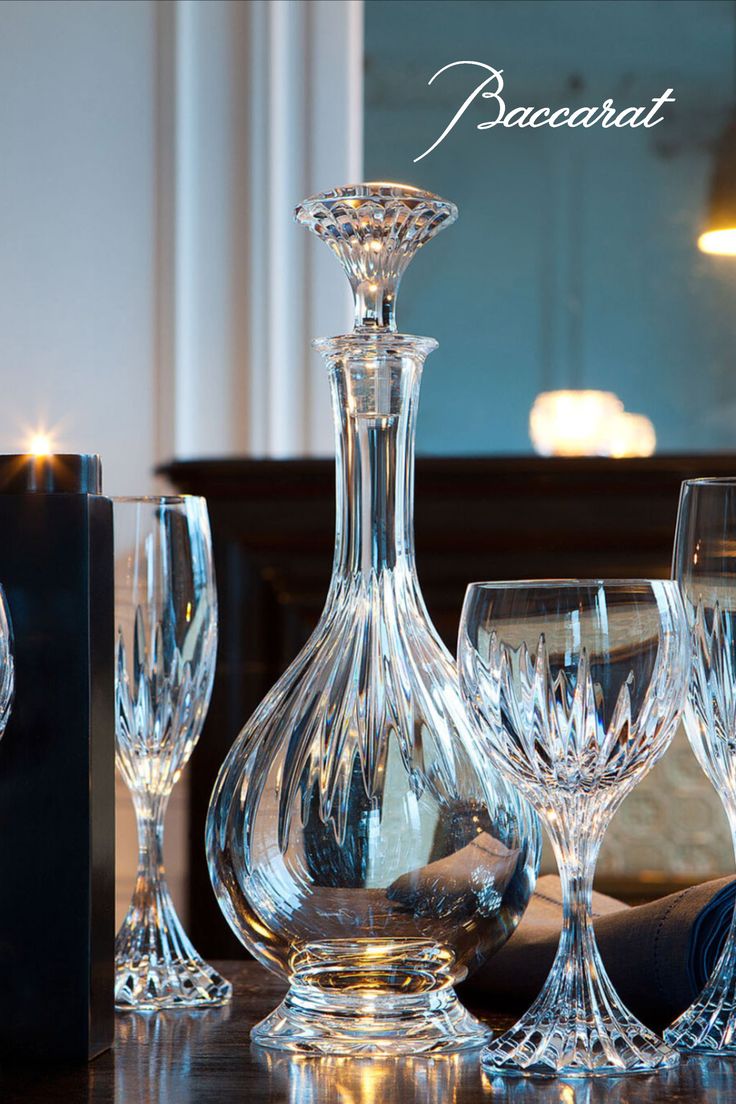 an assortment of crystal wine glasses and decanters on a table with the words decorat above them