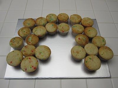 there are many muffins on the pan ready to be baked