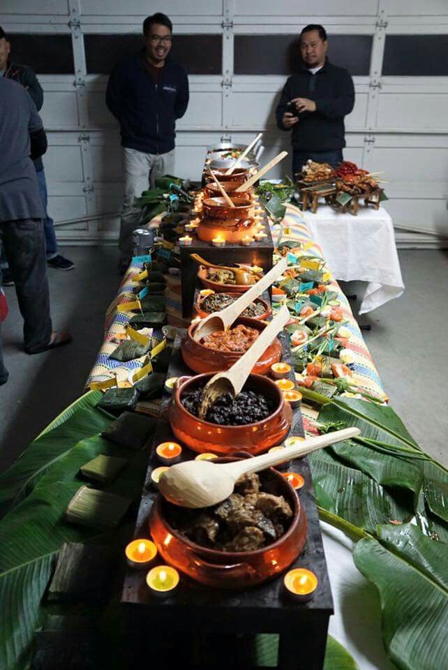 a long table filled with lots of food