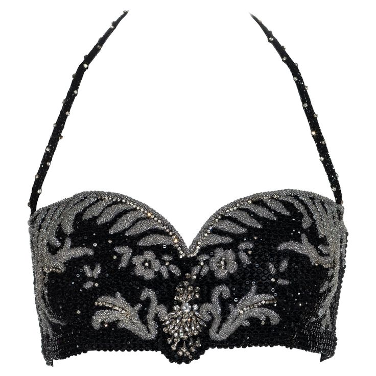 ▪ Gianni Versace silk corset bra ▪ Fully beaded with black and clear beads ▪ Crystal embellishment ▪ Halterneck ▪ Hook fastenings at centre back ▪ IT 42 - FR 38 - UK 10 - US 6 ▪ Fall-Winter 1989 Versace Corset, Wrestling Clothes, Bead Bra, Crystal Bra, Versace Sneakers, Versace Fashion, Corset Bra, Versace Outfit, African Print Fashion Dresses