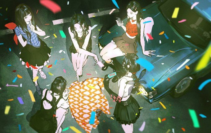 four girls standing in front of a car surrounded by confetti