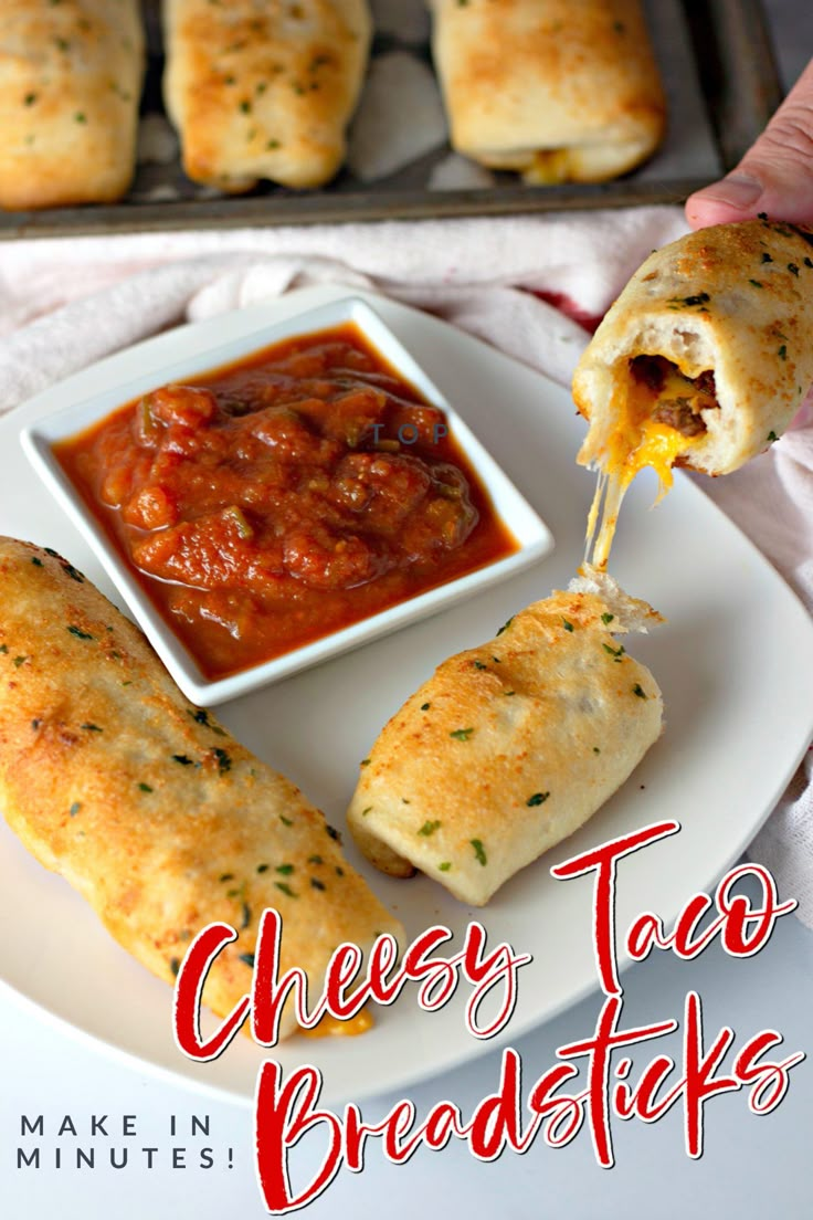 cheese taco breadsticks on a plate with sauce