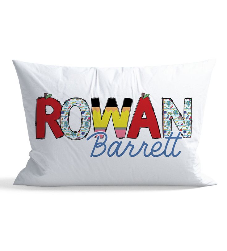 a white pillow with the word rowan in multicolored letters on it's side