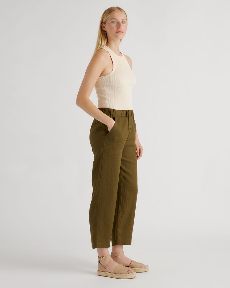 You're never going to look more chill than you will wearing these. They have a relaxed fit, three pockets, and elastic waist. Available in a wide variety of colors to suit your vibe. Our linen is made from 100% European flax, which is more sustainable and less resource-intensive to grow. Linen is the ultimate year-round fabric because it's breathable and naturally heat-regulating. Also offered in sizes 1X-3X.  | Quince | Women's 100% European Linen Pants in Martini Olive, Size XL Effortless Relaxed Fit Straight Leg Pants, Spring Bottoms With Side Pockets For Everyday, Cotton Pants With Pockets, Effortless Cotton Pants With Pockets, Spring Everyday Relaxed Fit Cargo Pants, Green Wide-leg Bottoms For Everyday, Spring Cargo Pants With Relaxed Fit, Everyday Green Wide Leg Bottoms, Green Wide Leg Bottoms For Everyday