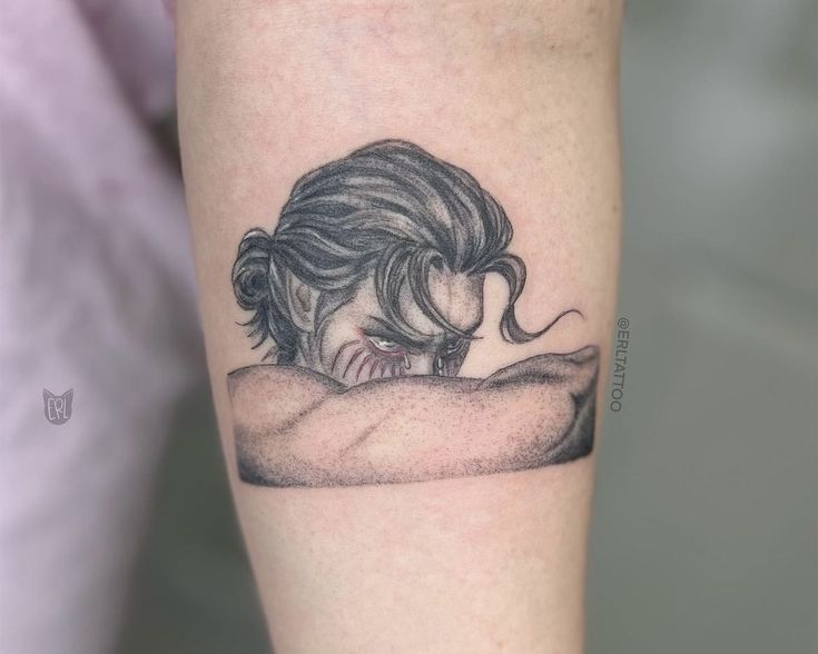 a woman's arm with a tattoo on it