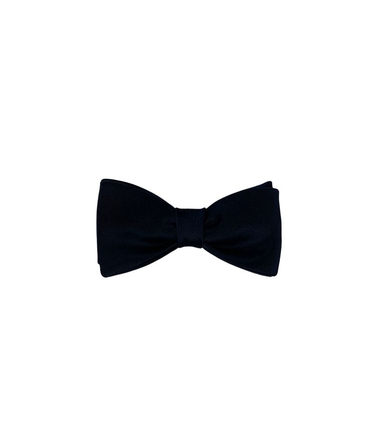 This classic 2 1/2″ (6.5 cm) wide black smooth duchess satin bowtie is handmade in the United States exclusively for Michael Andrews Bespoke. It is made from the same satin we use on our tuxedos. * Pre-tied * Adjustable length * 100% silk Solid Black Tie Bow With Ties, Classic Black Tie Event Bow Tie, Classic Black Tie With Decorative Bow, Solid Black Tie With Decorative Bow, Classic Bow Ties For Black-tie Events, Dapper Bow Tie Back Ties For Black-tie Events, Tuxedo Bow For Black-tie Events, Fitted Tuxedo Bow Tie For Evening, Tuxedo Accessories For Black-tie Events, Including Bow Tie