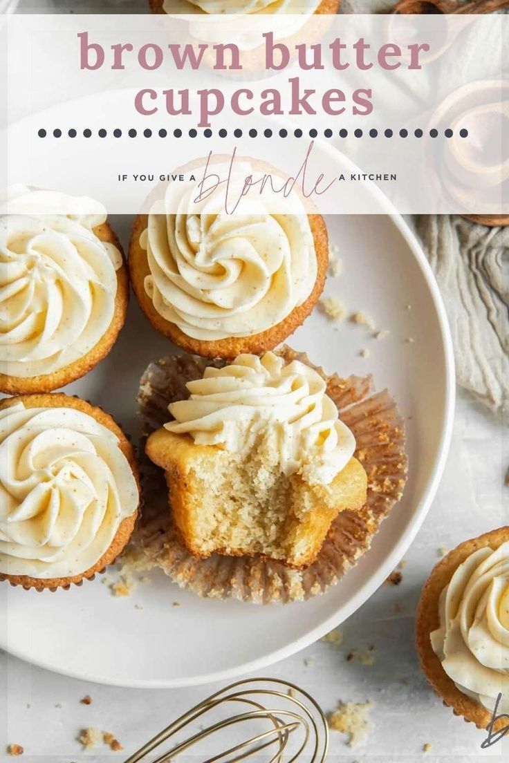 cupcakes with white frosting on a plate