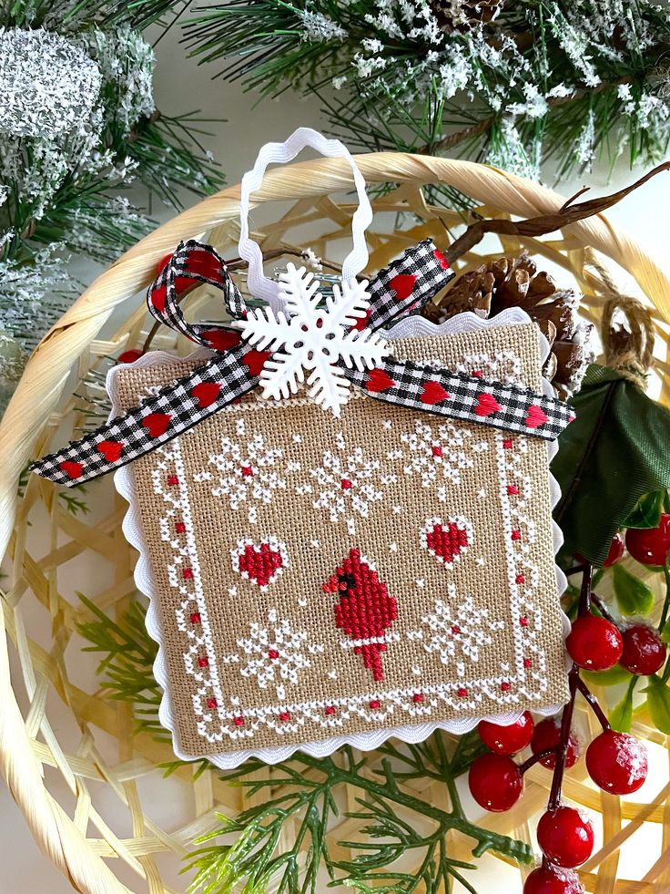 a christmas ornament hanging from a basket