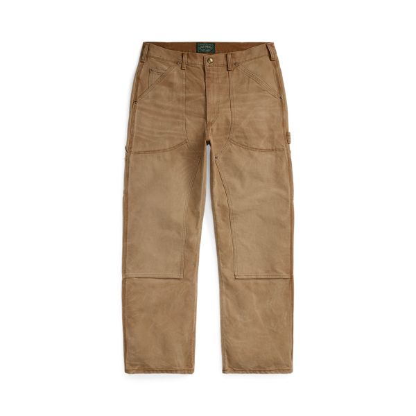 These pants unite a workwear-inspired silhouette with USA-made cotton canvas for a rugged look that is distinctly Polo. Rugged Straight Leg Pants For Fall, Utility Chino Cotton Twill Pants With Pockets, Utility Pants In Chino Cotton Twill With Pockets, Work Pants With Five Pockets In Chino Cotton Twill, Rugged Fall Pants With Pockets, Utility Cotton Pants With Standard Cut, Brown Cotton Cargo Pants With Welt Pockets, Rugged Bottoms With Pockets For Fall, Chino Twill Cargo Pants For Workwear