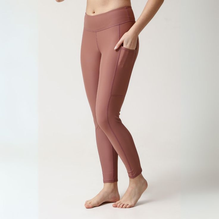 Sculpting slim-fit, mid-waist Swim Tights with compression fabric that holds in your tummy. Discreet pocket to upper thigh.  UPF50+ sun protection  Soft and breathable Muscle control and shape retention Two-way stretch for perfect fit  Pilling resistant Ultrachlorine resistant 78% ECONYL® regenerated nylon, 22% Elastane.   ECONYL® yarn is a 100% regenerated nylon fibre from pre and post-consumer waste such as fishing nets and other nylon waste. This sustainable techno-fabric is versatile, hyper- Moisture-wicking Nylon Activewear For Beach, Full Length Moisture-wicking Activewear In Recycled Polyester, Moisture-wicking Compression Nylon Activewear, Nylon 4-way Stretch Bottoms For Swimming, Compression Moisture-wicking Nylon Swimwear, Full Coverage Swimwear, Compression Fabric, Kids Swimwear, Swim Dress