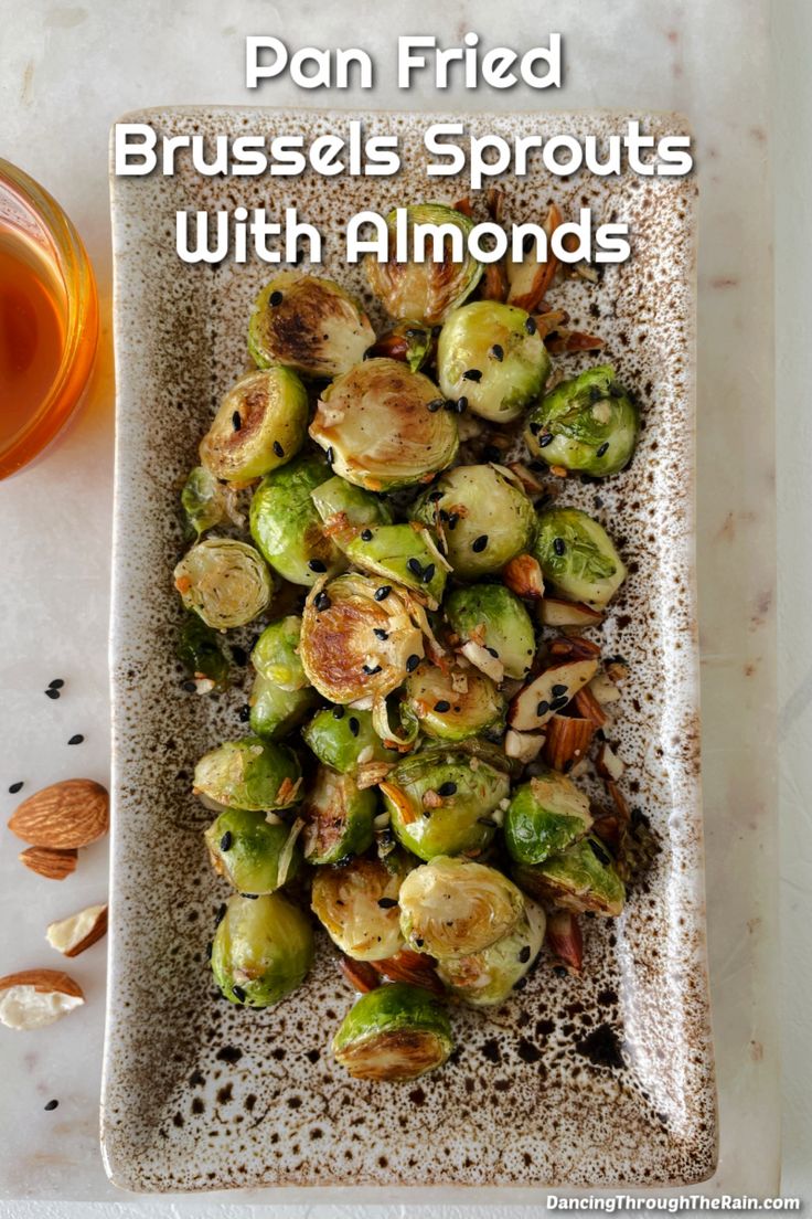 Pan Fried Brussels Sprouts with Almonds on a rectangular serving dish on a white table Sides Dinner, Pan Fried Brussel Sprouts, Best Brussels Sprouts, Fried Brussels Sprouts, Crispy Brussels Sprouts, Fried Brussel Sprouts, Easy Side Dish, Brussels Sprouts, Family Friendly Meals