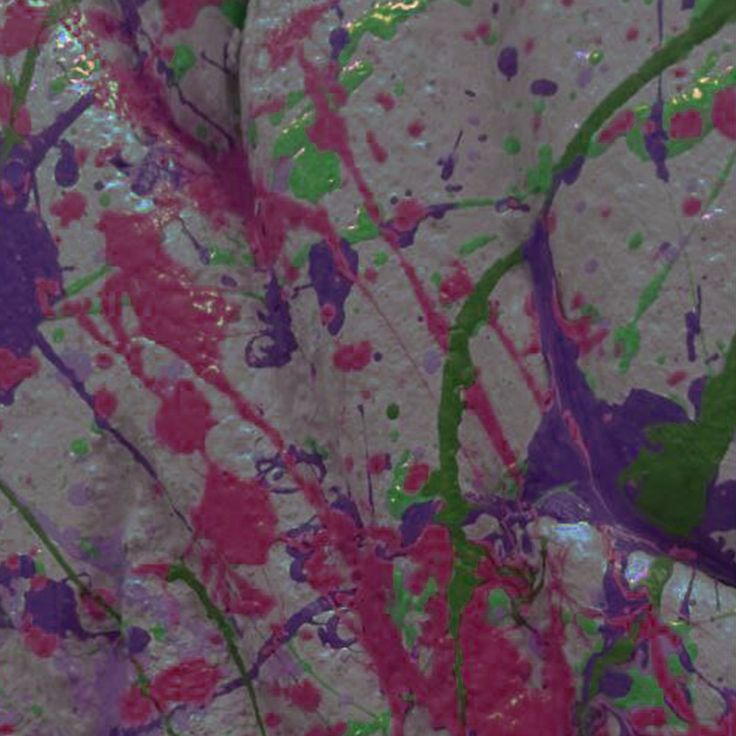 an abstract painting with lots of paint splattered on it