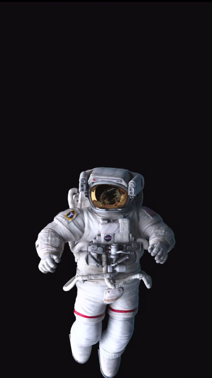 an astronaut floating in the air with his hands on his hips and feet apart from him