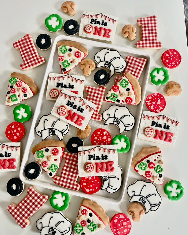 decorated cookies arranged in the shape of letters and numbers