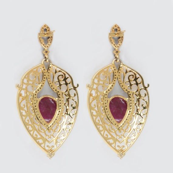 ⚫ This Earrings made with ruby & diamonds in 14k yellow gold, 925 sterling silver,⚫ Pave Diamond Gemstone Earrings 925 Sterling Silver Jewelry.⚫ Gemstone Earrings, Diamond Earrings , Silver Earrings , Everyday Jewelry⚫ Special customize for Mother's day, Anniversary, Birthday Gift, Valentine, Christmas. ⚫ Item Details:Gross Weight:12.64 Grams14k Yellow Gold Weight:0.322 Grams925 Sterling Silver Weight:10.42 GramsDiamond Weight:0.89 CaratsGemstone Weight:8.6 CaratsItem Size: 57 x 27 mmItem SK Luxury Pierced Chandelier Earrings For Anniversary, Luxury Pierced Chandelier Earrings For Formal Events, Luxury Filigree Diamond Earrings For Wedding, Fine Jewelry Teardrop Bridal Earrings With Elegant Design, Luxury Pierced Earrings For Party, Glamorous Gold Plated Earrings For Weddings, Glamorous Gold Plated Wedding Earrings, Teardrop Bridal Earrings With Elegant Design, Exquisite Bridal Earrings For Formal Occasion