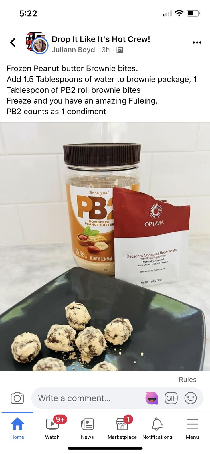 a plate with cookies and a jar of peanut butter next to it on a counter