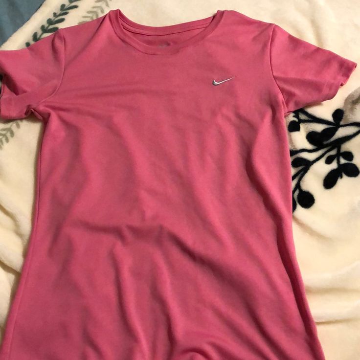 Pink Dri-Fit Shirt. Bought Off Thred Up, Never Worn Nike Fitted Tops In Solid Color, Nike Fitted Solid Tops, Nike Fitted Casual Shirt, Nike Fitted Short Sleeve Top, Casual Stretch Nike T-shirt, Casual Nike Stretch T-shirt, Nike T Shirts Rosa, Casual Pink Nike Shirt, Nike Pink Long Sleeve Tops