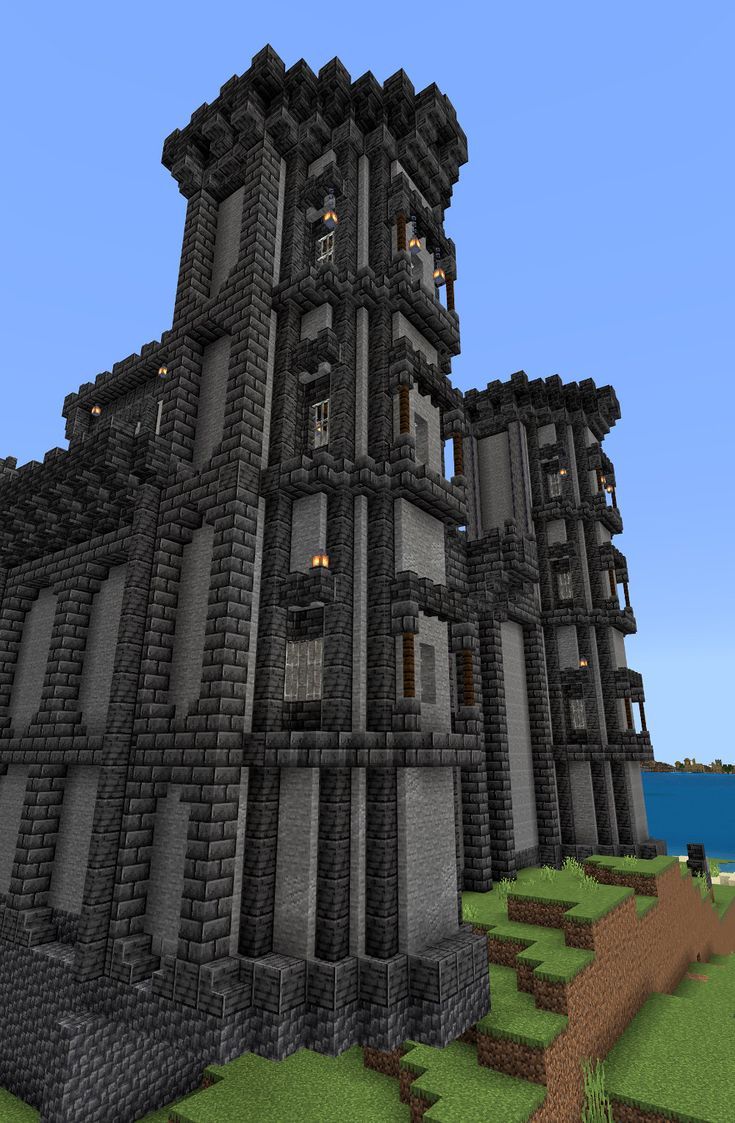 Minecraft castle or keep towers in our survival world. Minecraft Andesite House, Minecraft Wall Tower, Minecraft Basalt Builds, Minecraft Keep Ideas, Blackstone Tower Minecraft, Deepslate Buildings, Dark Tower Minecraft, Deepslate Minecraft Buildings, Minecraft Castle Tower Roof