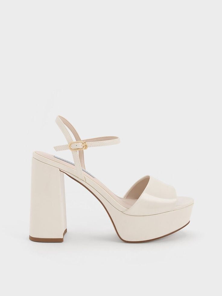 Chalk Halle Peep-Toe Metallic Platform Sandals | CHARLES & KEITH Elegant Sandals With Chunky Platform And Block Heel, Elegant Heels With Chunky Platform And Block Heel, Chic Chunky Platform Sandals With Open Heel, Elegant Chunky Platform Open Toe Sandals, Beige Chunky Platform Heels For Party, Party Beige Chunky Platform Heels, Elegant Spring Block Heels With Chunky Platform, Cream Wedge Sandals With Platform And Open Heel, Elegant Wedge Sandals With Platform And Block Heel