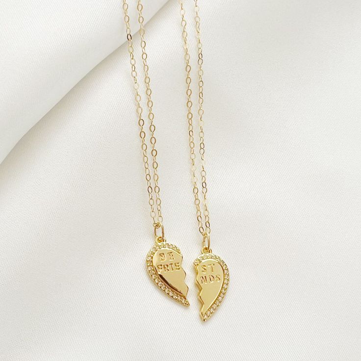 The NEW Bestie Necklace set makes the perfect gift! Featuring two 14k gold filled best friend charms strung on our signature 14k gold filled dainty cable chains. Length: 18” Chain: 14k gold filled signature dainty cable chain Charm: 22mm Chain does not turn, tarnish, or rust Handmade with the highest standards & quality materials Includes 100% organic cotton jewelry pouch This item is made to order and shipped with love from our studio located in West Chester, PA. *Click here to learn more about Mother's Day 14k Gold-filled Charm Necklaces With Delicate Chain, Gold Charm Necklaces For Valentine's Day And Friendship, Dainty Charm Necklaces With Cable Chain For Anniversary, 14k Gold Filled Jewelry For Friendship, Dainty Gold Necklace For Friendship, Gold 14k Gold Filled Jewelry For Friendship, Gold 14k Gold-filled Jewelry For Friendship, Personalized Gold Charm Necklaces For Best Friend Gift, Gold Necklaces For Best Friend Gift On Mother's Day