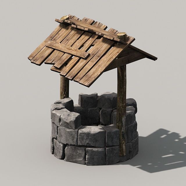 a small wooden structure made out of rocks and wood with a fire pit underneath it