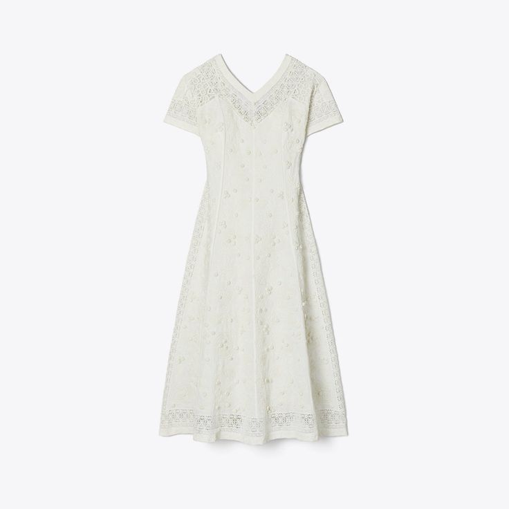 The v-neck dress has a vintage-inspired silhouette, expertly constructed in embroidered linen and cotton. Flattering and versatile, with a nipped-in waist, flutter sleaves and a tea-length skirt. Elegant Daywear Dress With Chikankari Embroidery, Elegant Chikankari Embroidery Day Dress, Elegant Chikankari Embroidery Dresses For Daywear, Elegant Summer Linen Dress With Floral Embroidery, Elegant Spring Embroidered Linen Dress, Elegant Embroidered Linen Dress For Spring, Elegant Linen Embroidered Dress For Spring, Fitted Linen Embroidered Dress For Summer, Fitted Embroidered Linen Dress For Summer