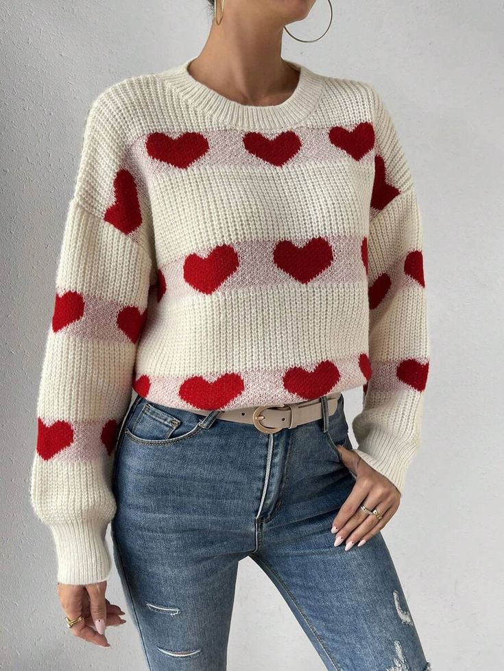 That SHEIN Frenchy Heart Pattern Drop Shoulder Sweater in white sounds like a perfect choice for Valentine's Day! The combination of striped and heart patterns adds a unique and playful touch to the sweater. With its long sleeves and regular length, it's perfect for a casual and comfortable look. Pair it with your favorite jeans or leggings, and you'll be ready to celebrate in style. Have a fantastic Valentine's Day! 💕👚 Trendy Fall Sweater With Heart Print, Trendy Heart Print Sweater For Winter, Knit Crew Neck Sweater With Heart Print, Trendy Heart Graphic Sweater For Fall, Casual Heart Graphic Sweater For Fall, Casual Fall Sweater With Heart Graphic, Cute Heart Graphic Sweater For Fall, Cute Heart Print Winter Sweater, Cute Winter Sweater With Heart Print