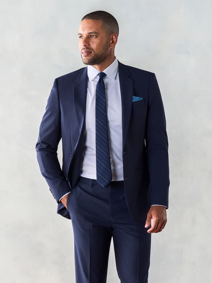 Stretch Wool True Navy Suit – The Black Tux - Buy New Blue Notch Lapel Tuxedo For Work, Tailored Blue Business Pantsuit, Tailored Blue Pantsuit For Business, Professional Blue Pantsuit For Business, Blue Slim Fit Tuxedo For Workwear, Professional Navy Blazer For Formal Occasions, Navy Professional Blazer For Formal Occasions, Professional Blue Tuxedo In Suiting Fabric, Blue Fitted Business Pantsuit