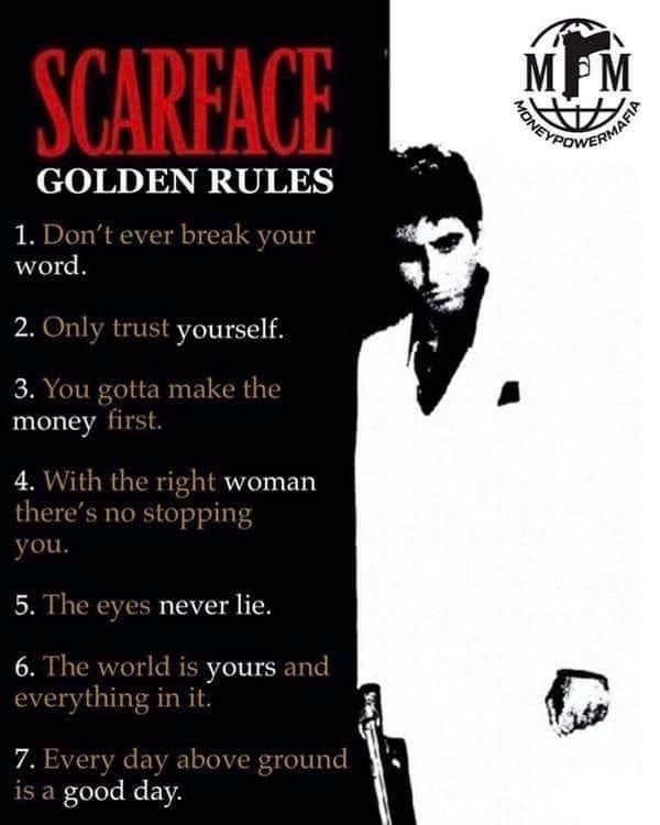 a man in a white suit and tie with the words scarface written on it