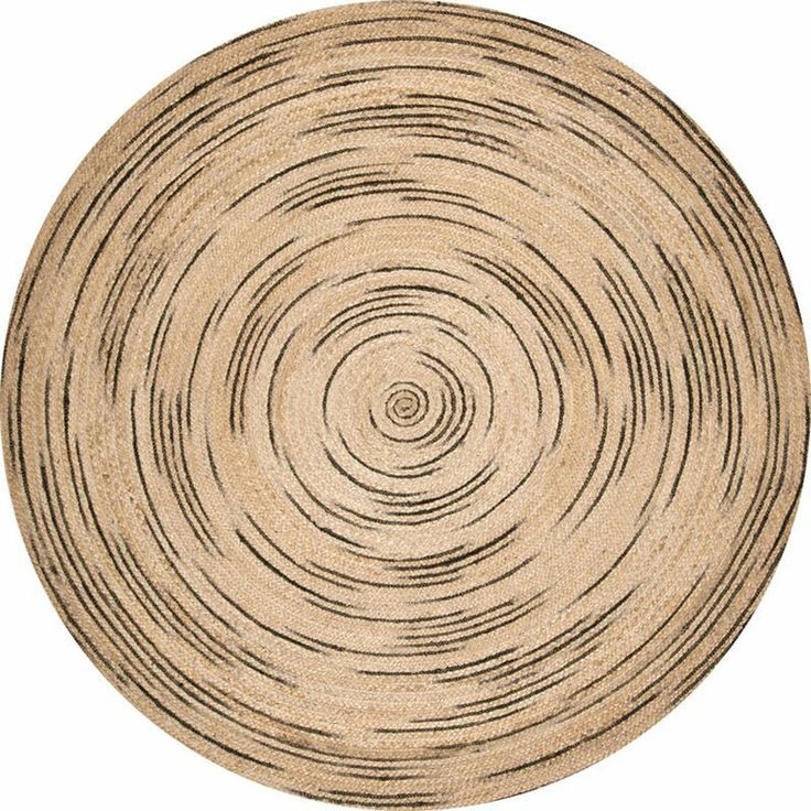 a round rug with black lines on it