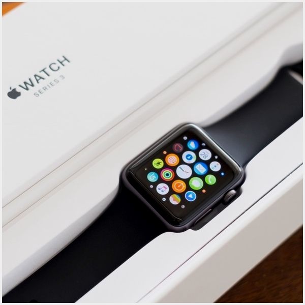 an apple watch sitting in a white box