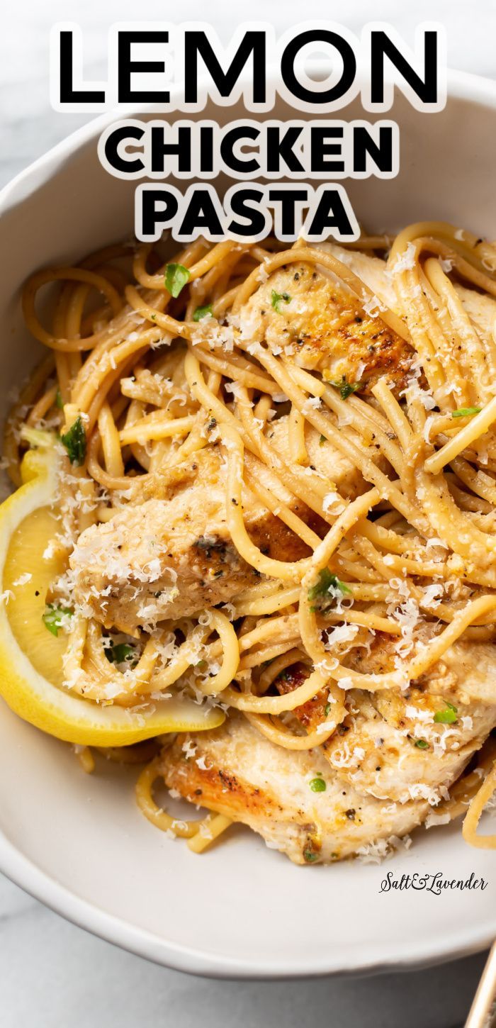 lemon chicken pasta in a white bowl with parmesan cheese