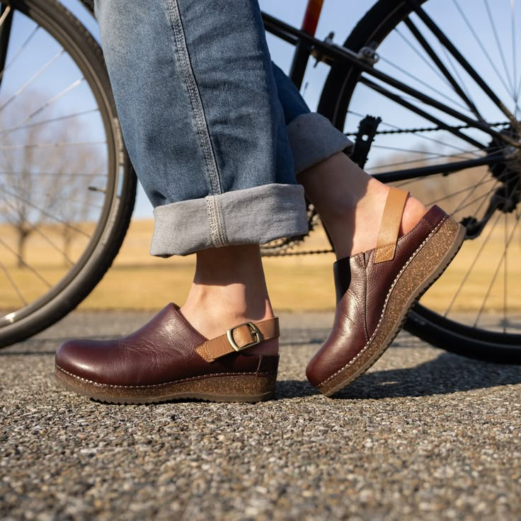 We used our patented stapled construction to add high-quality leathers to a midsole made with sustainable and durable cork in Merrin. A heel strap on this thoughtfully crafted mule provides a lighter take on support, and leathers produced with waste-reducing methods will give you a wardrobe staple you can feel good about. Womens Clogs Outfits, Colorado Shoes, Fluffy Fashion, Work Closet, Teacher Shoes, Smartwool Socks, Fancy Footwear, Mary Jane Clogs, Running Sandals