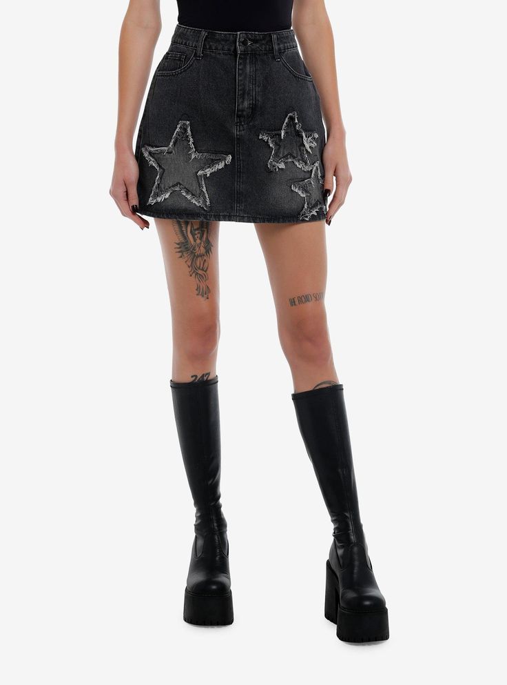 It's a baddie summer! Step outside with this black denim skirt. It has an A-line silhouette  and features star patches on the front with frayed detailing. Comes with hip and back pockets.Please note: Style is fitted with no stretch; size up for a looser fit.100% cottonWash cold; dry flatNon-stretch materialLength: 16''ImportedListed in junior sizesModel is 5'10''Model wears size Small Black Denim Pleated Skirt, Black Denim Punk Skirt, Black Punk Denim Skirt, Punk Black Denim Skirt, Black Punk Denim Skirt For Spring, Black Denim Skirt For Summer, Summer Black Denim Skirt, Black Punk Denim Skirt For Streetwear, Punk Style Black Mini Denim Skirt