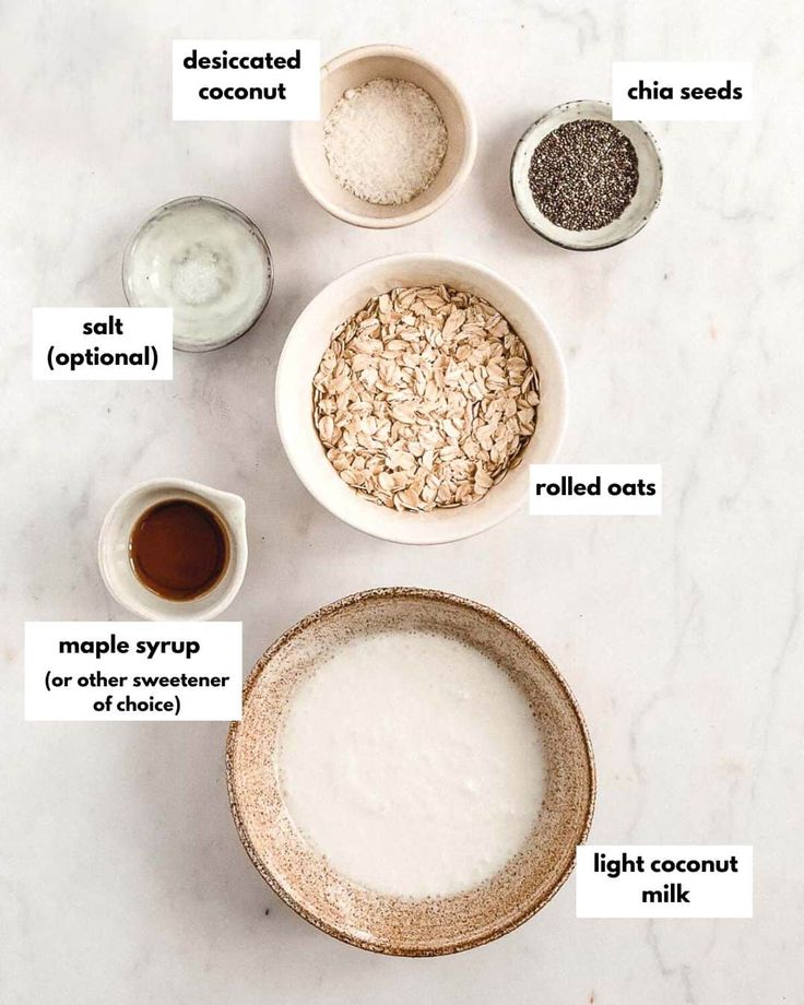 ingredients to make oatmeal smoothie laid out on a white counter top